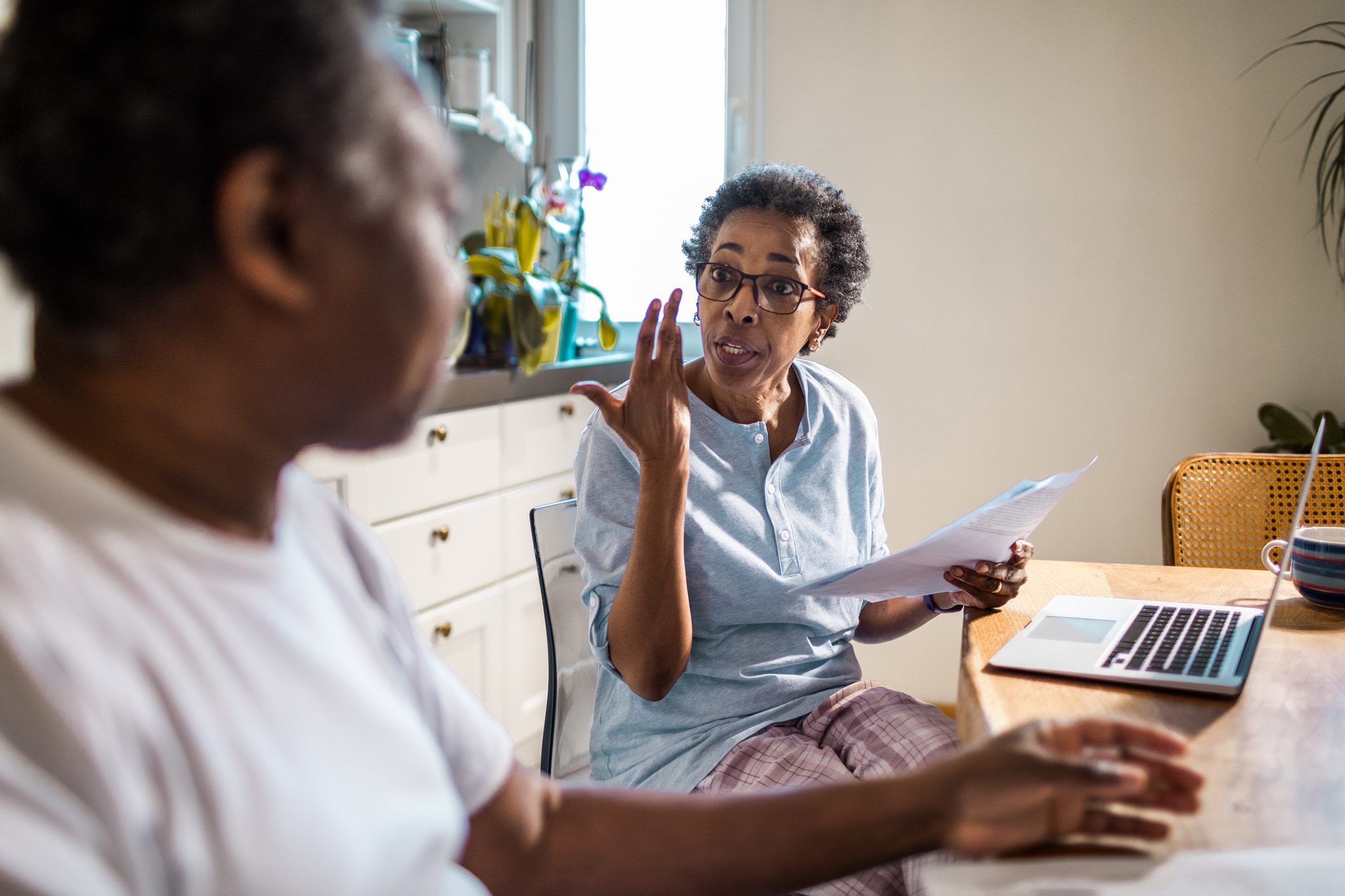 Senior couple going over their home finances