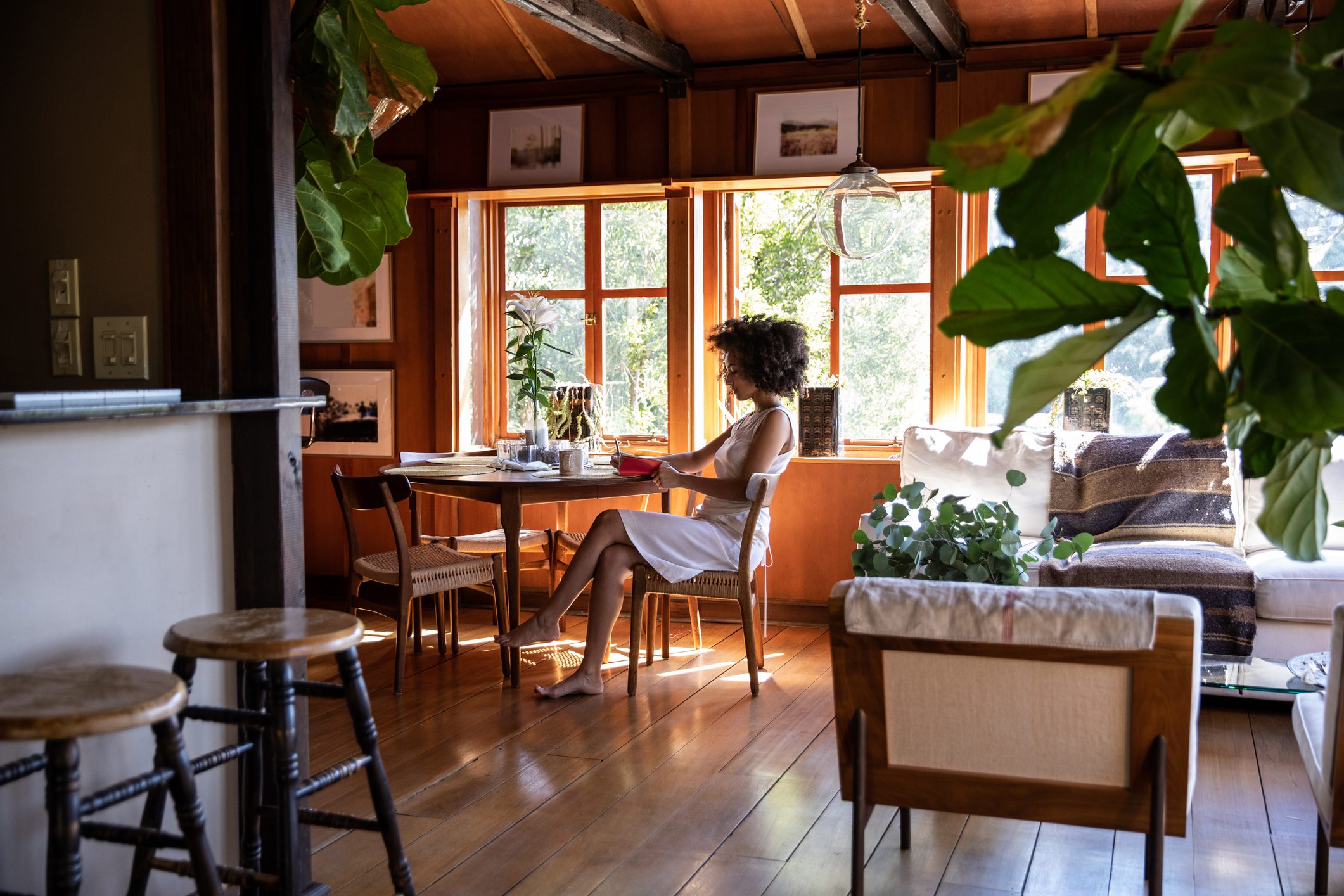 Young woman spending a relaxing day in her beautiful home