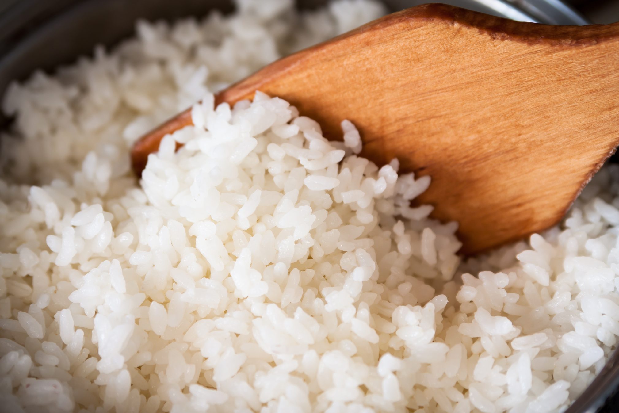 White rice in a metal pan.