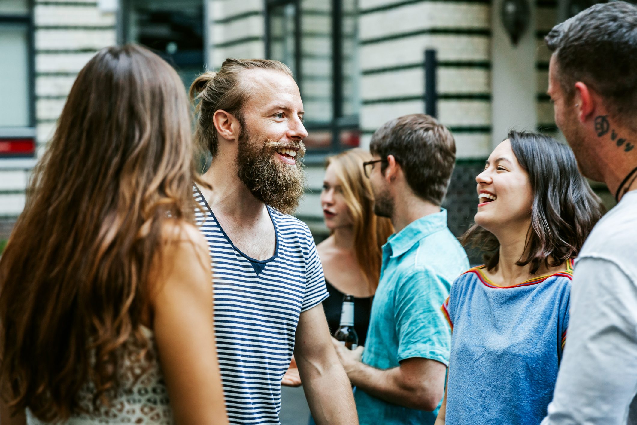 A Group Of Friends Meeting Together At Barbecue