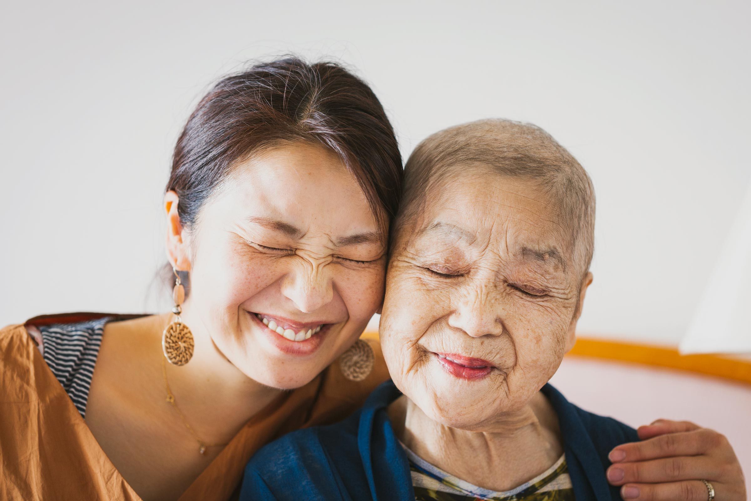 Portrait of old mother and her middle aged daughter