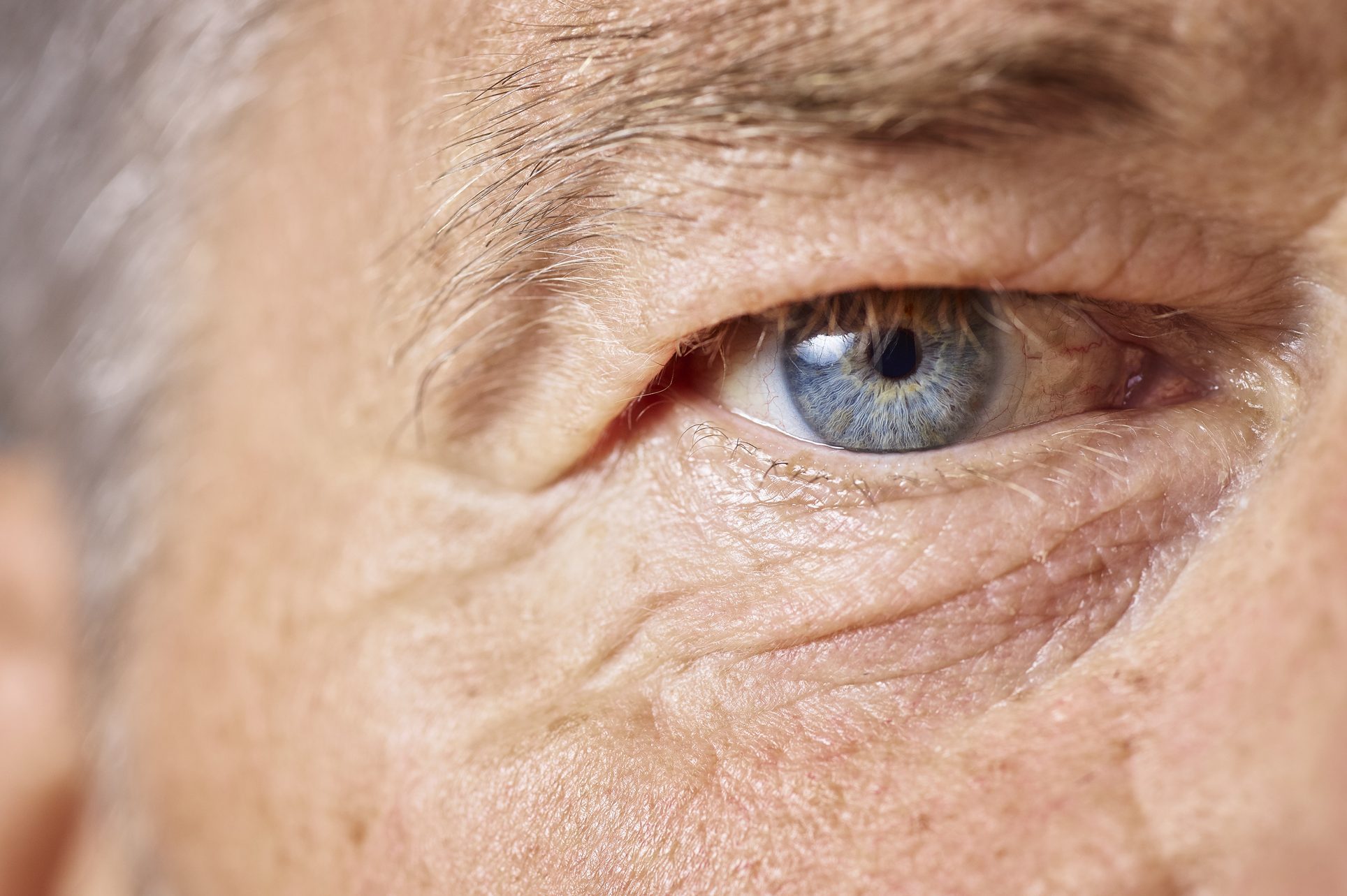 Blue eye of mature man