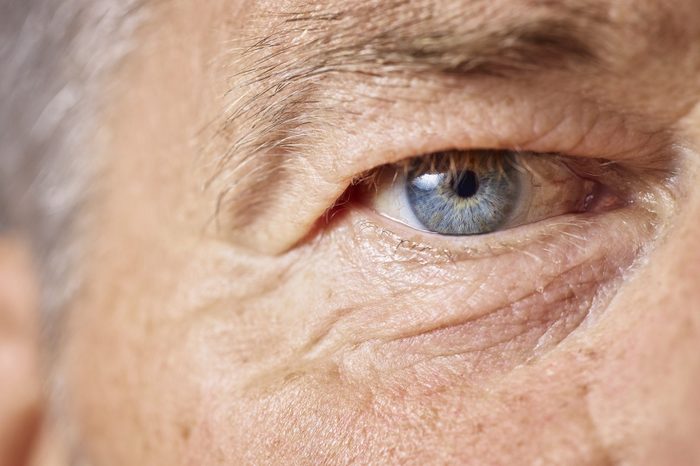 Blue eye of mature man