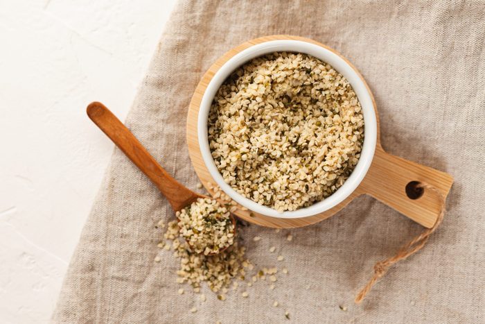 Cannabis kernels in a white bowl on the table