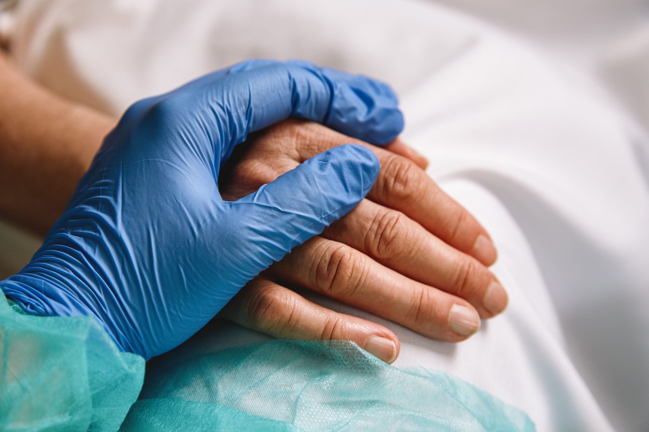 Healthcare worker giving support and love to a patient