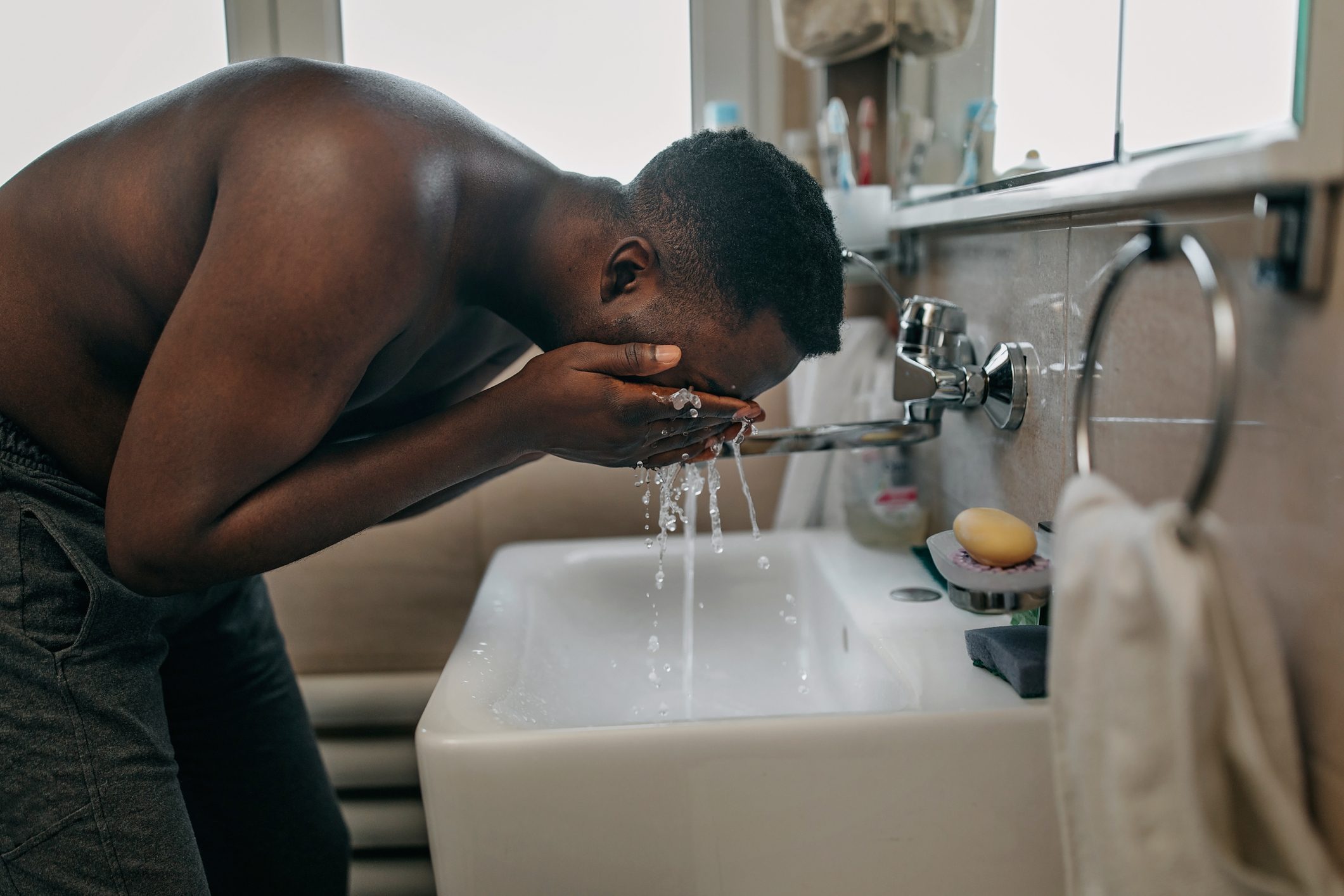 Young man doing morning rituals