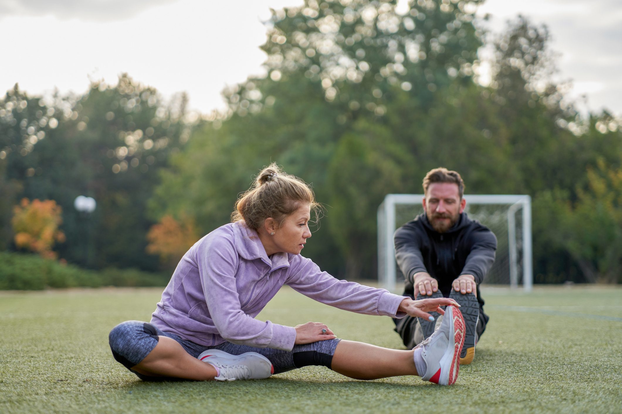 middle-aged woman doing stretching exercises