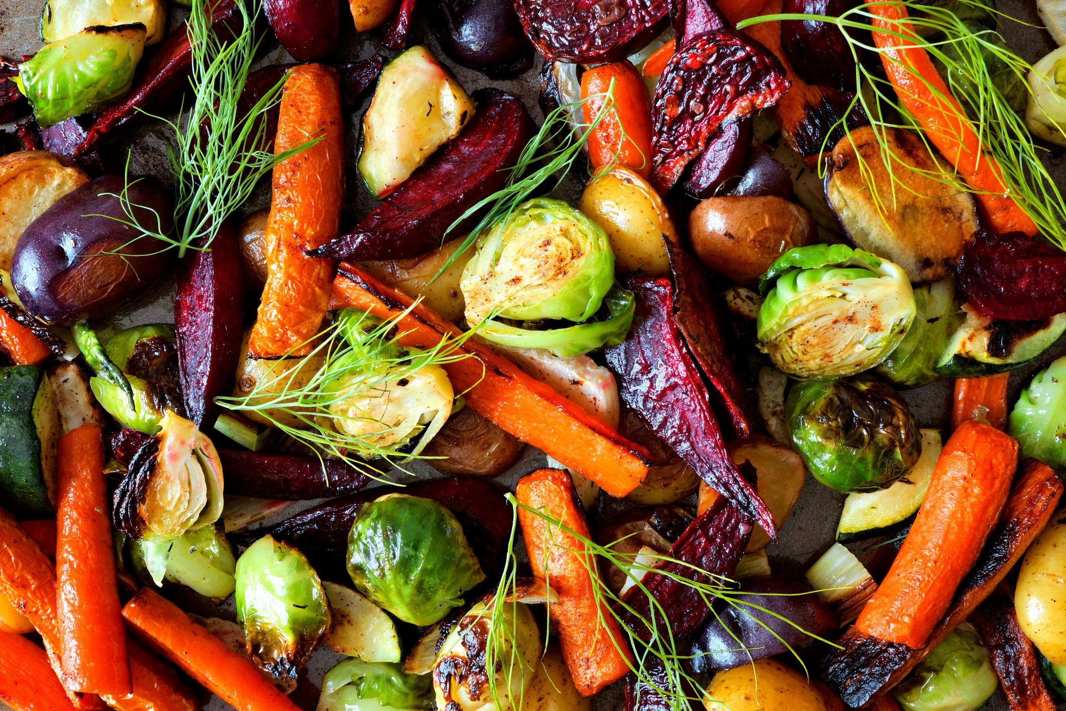 Full background of roasted autumn vegetables