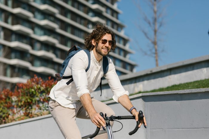 Well-dressed young businessman commuting to work