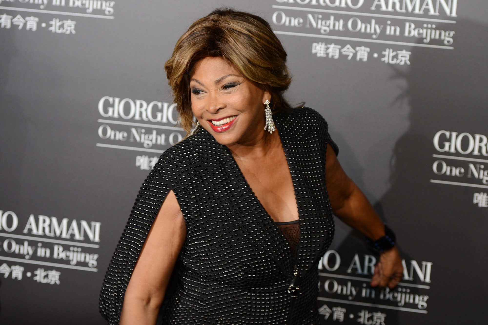 Tina Turner arriving on the red carpet for the fashion show by 77-year-old designer Giorgio Armani at the 798 art complex in Beijing on May 31, 2012