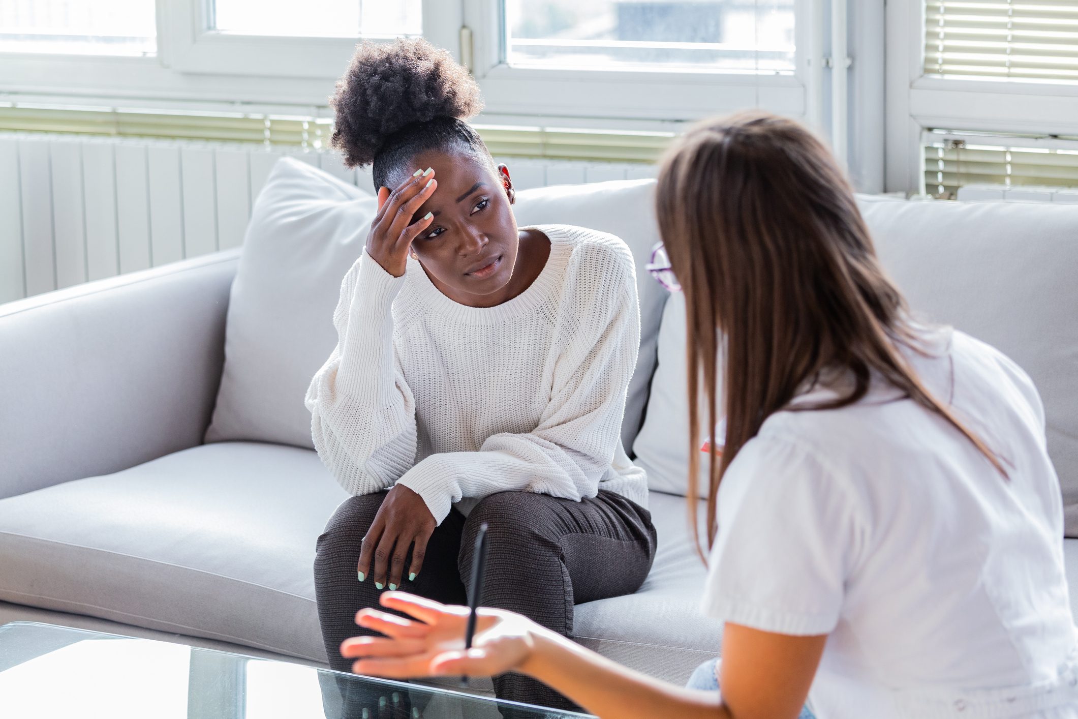 Patient receiving bad news, She is desperate and crying, Doctor support and comforting her patient with sympathy. Don't worry, this medical test is not so bad