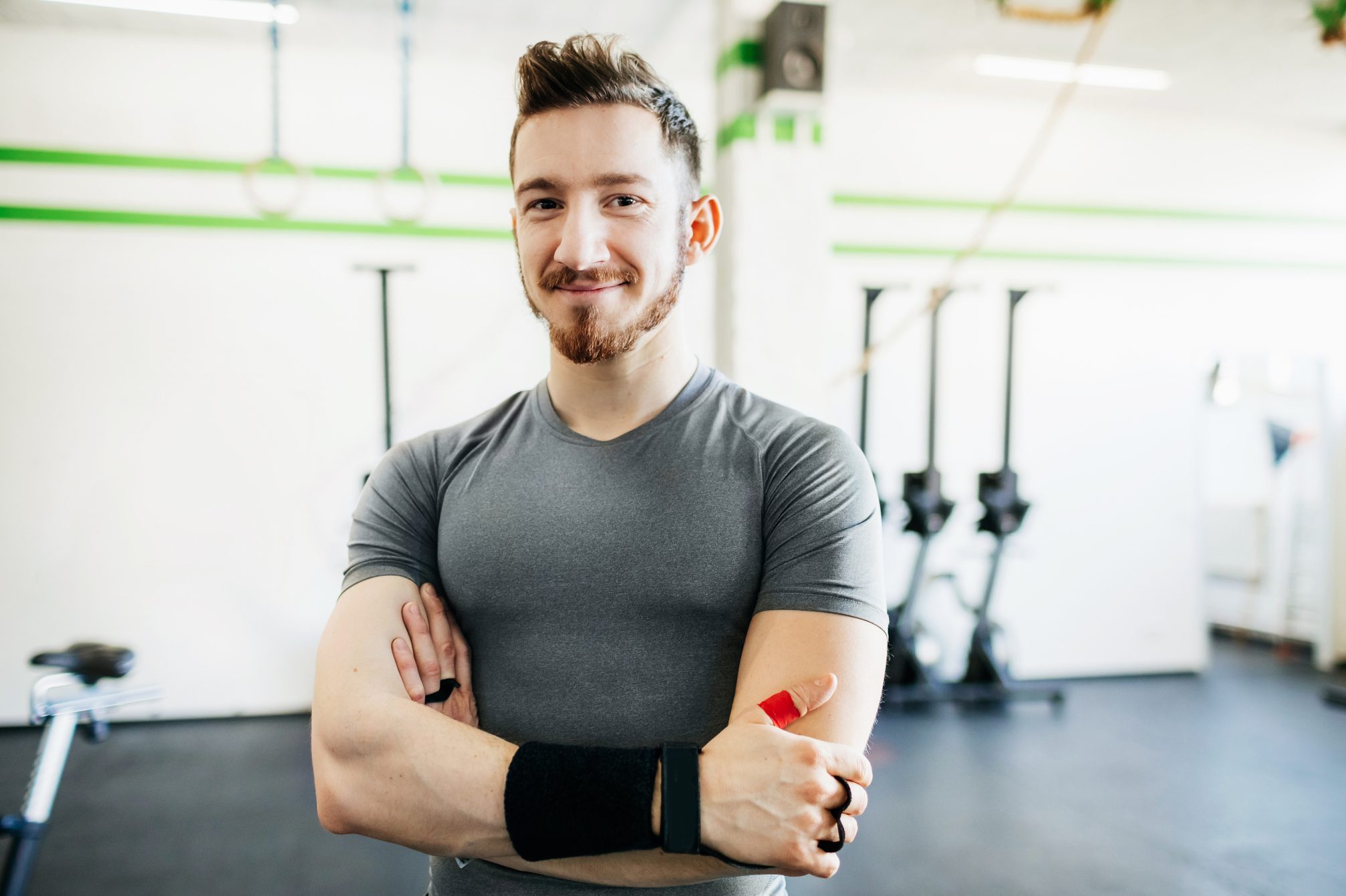 Portrait Of Fitness Trainer At Gym