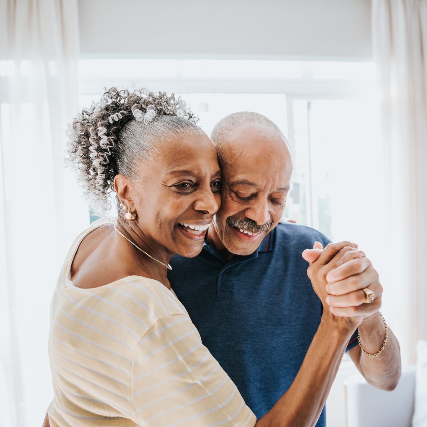 senior couple dancing together