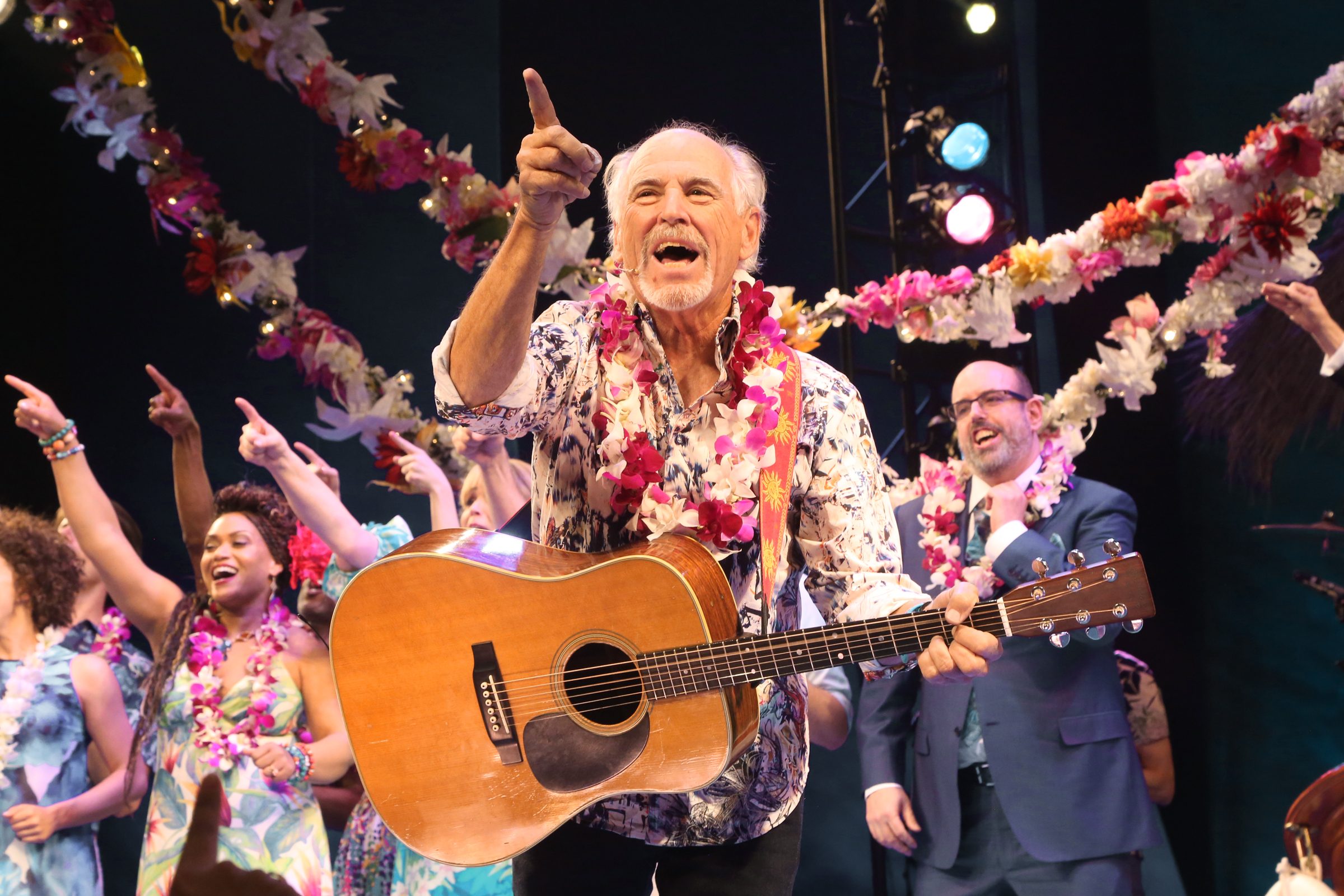 Jimmy Buffett with guitar Margaritaville