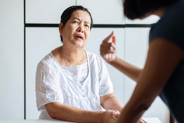 confused woman talking to someone