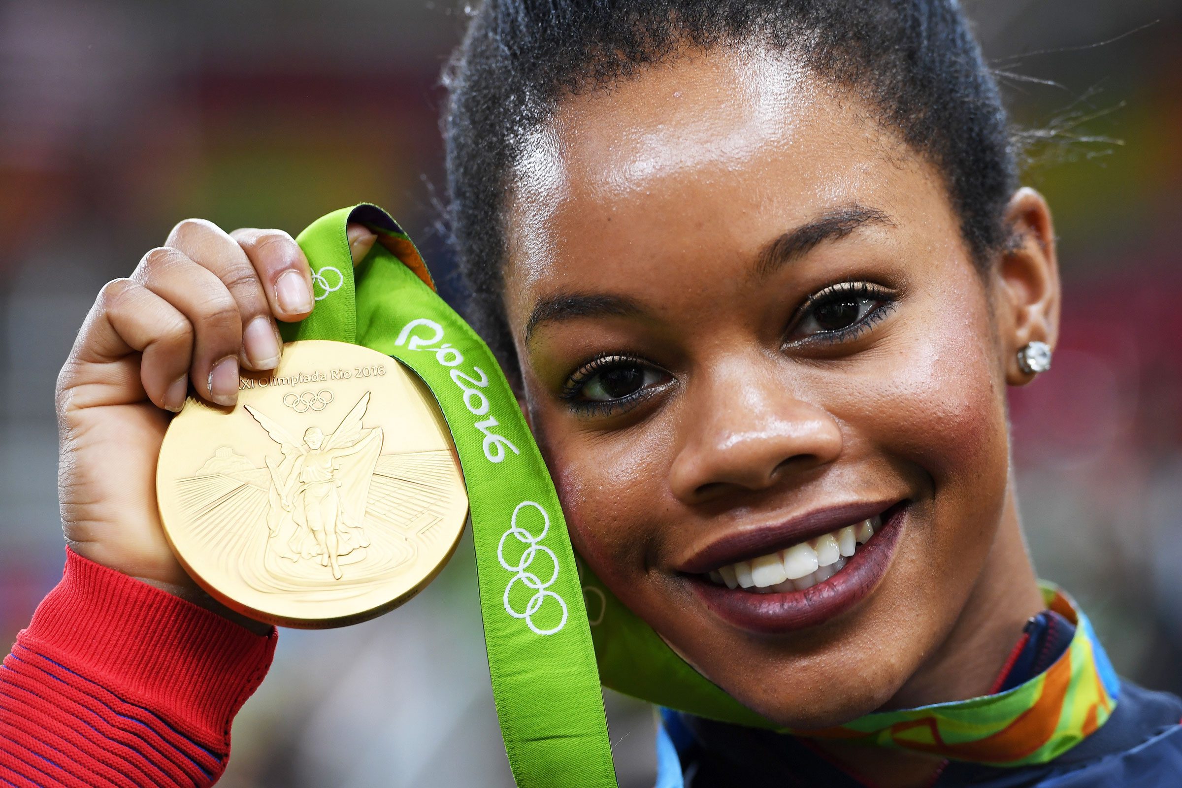Gabby Douglas with metals