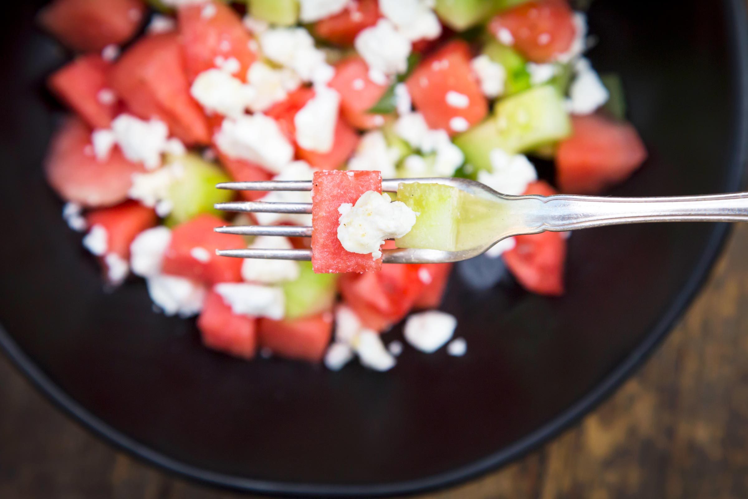 Bowl of salad with watermelon, cucumber, mint and feta