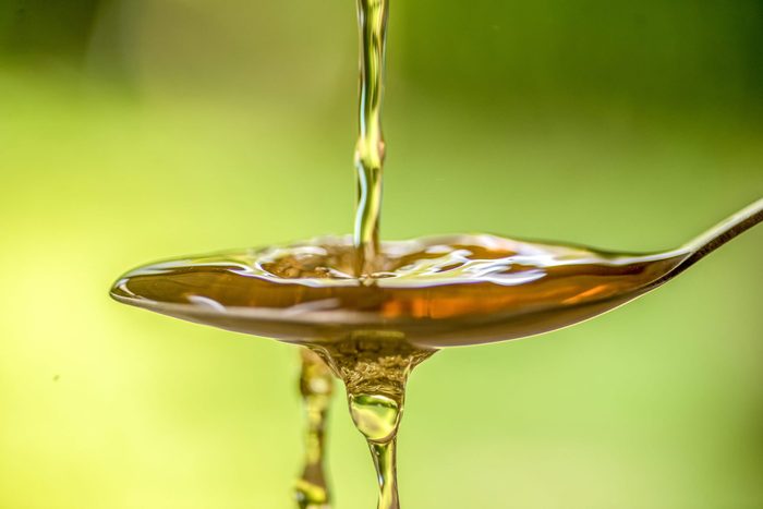 Yellow vinegar on spoon