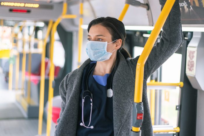 An exhausted nurse travels to work