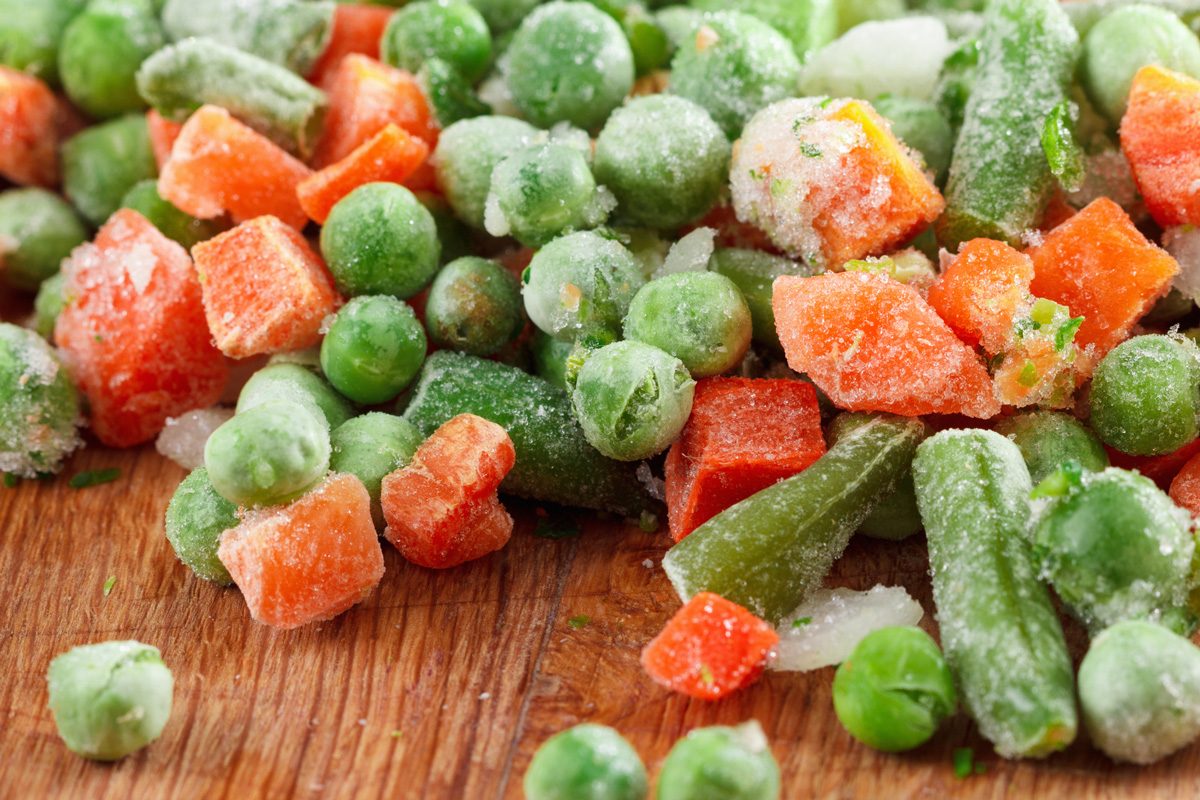 frozen vegetables on cutting board