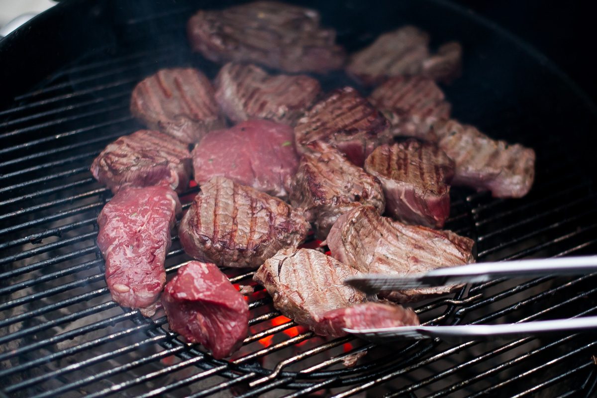 meat barbecue being prepared on grill